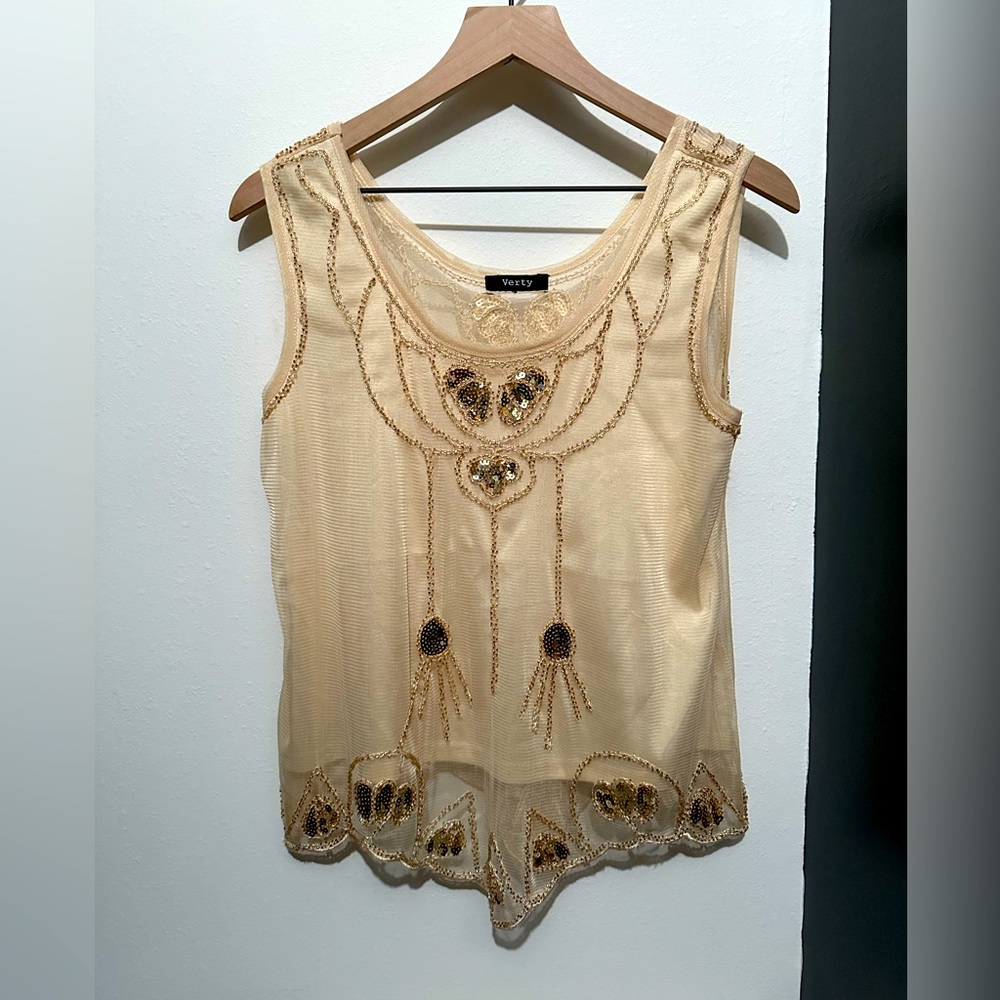 Verty gold sequined tank top.